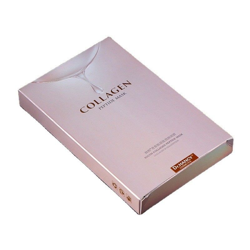 Maschera di cartone per la cura della pelle, trucco, confezione in scatola con superficie colorata e luccicante.