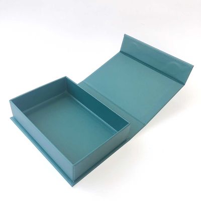 Contenitore di regalo magnetico solido blu di rettangolo con il nastro